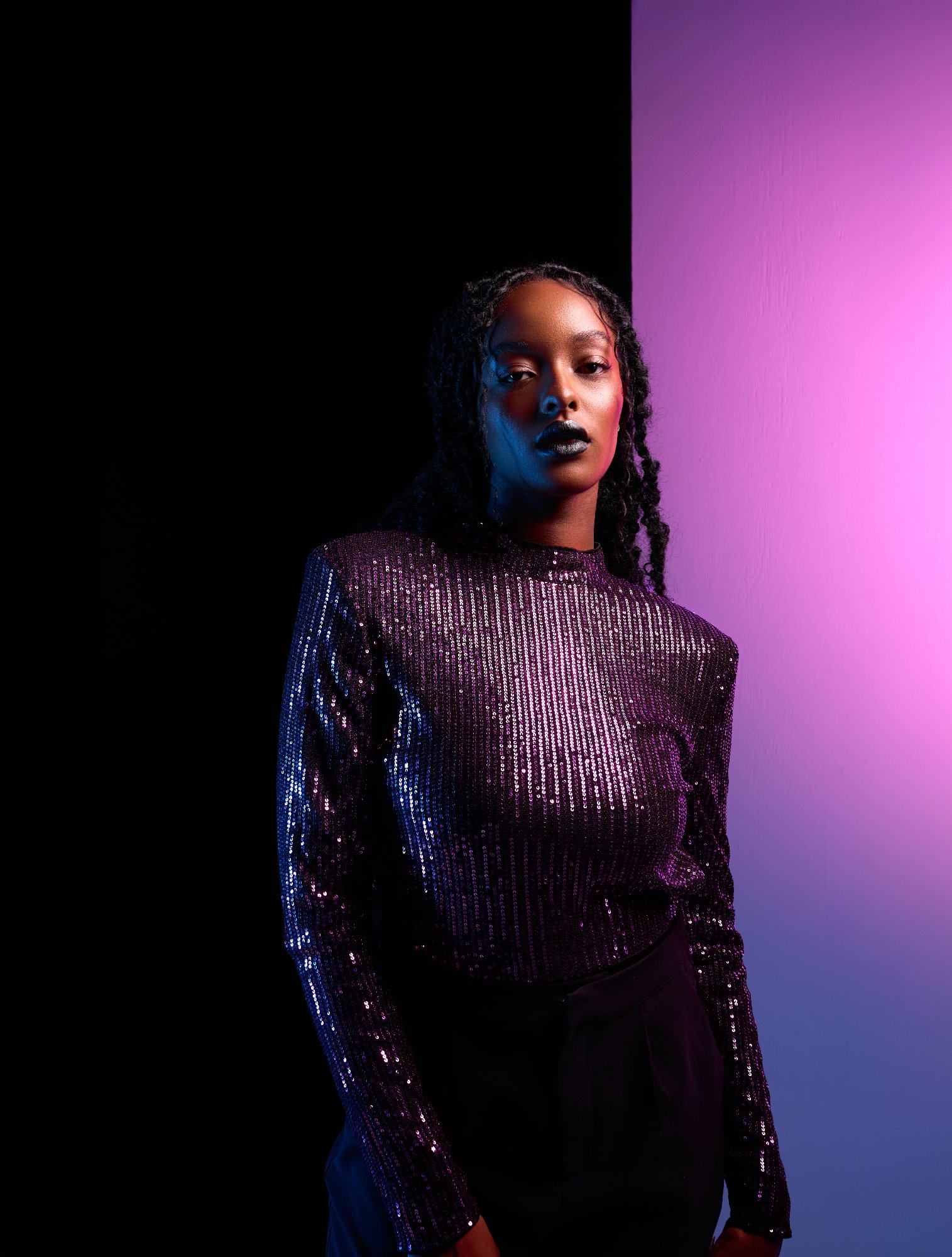 Editorial portrait with purple gel and sequin styling — Montreal studio