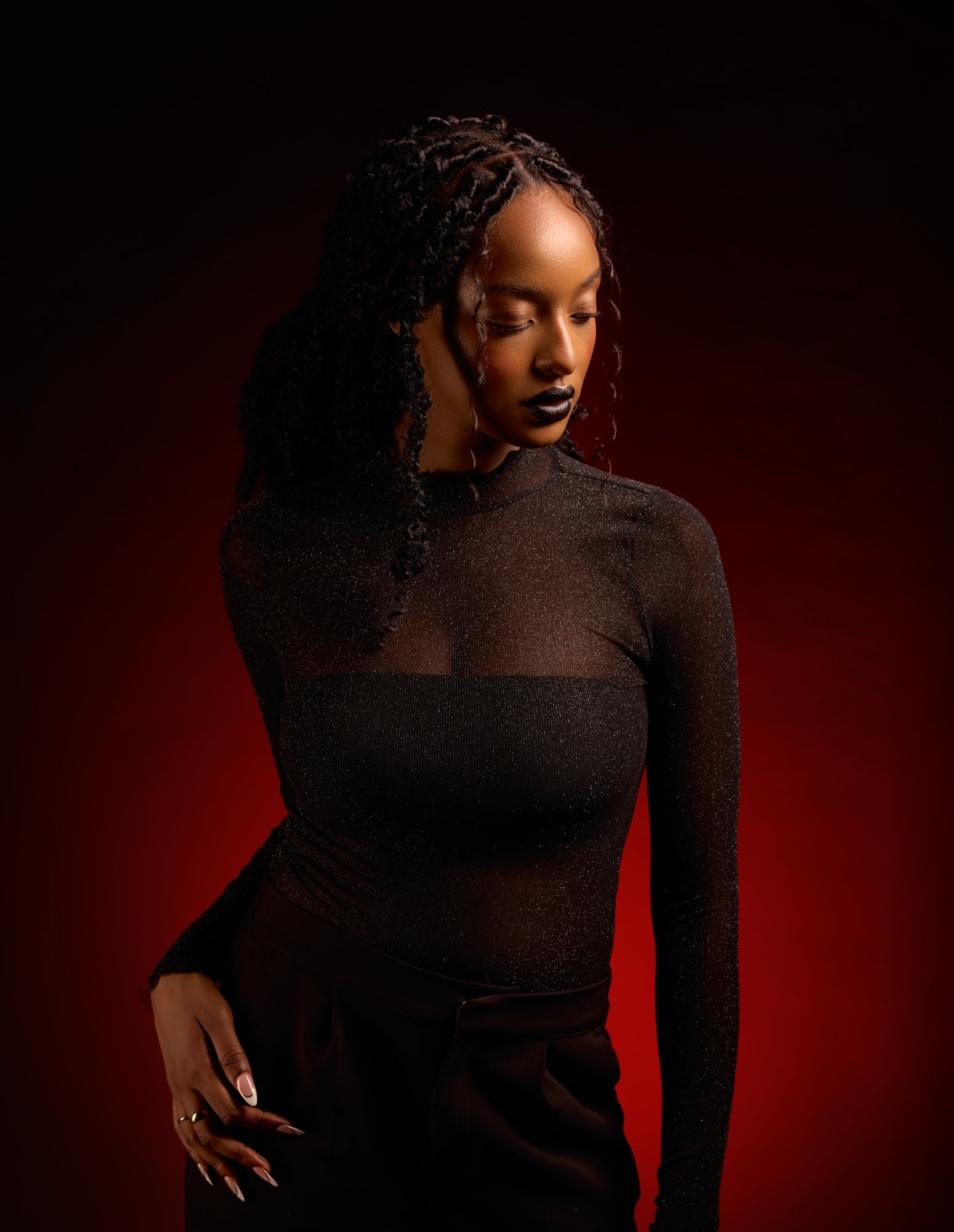 Red gel editorial fashion portrait — Écho Visuel studio Montreal